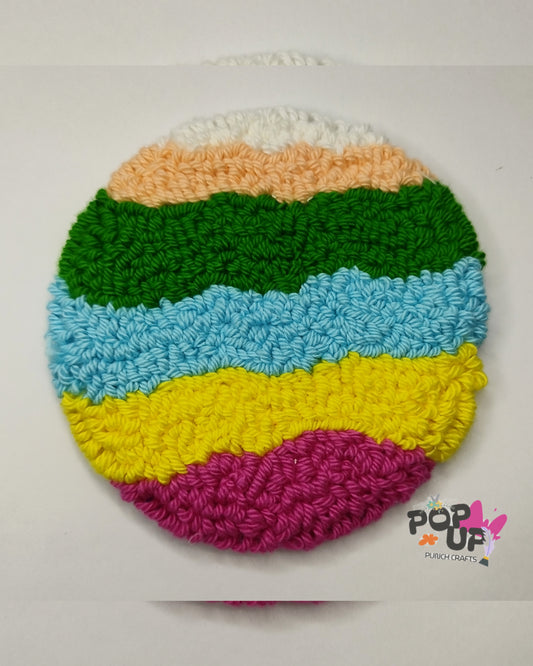 Colorful pattern mug rugs and coasters available at www.Popopunchcrafts. In with 4 inch size and round shape